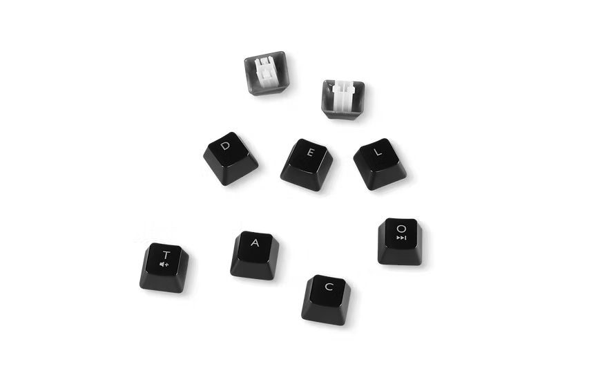 RGB Gaming Keyboard Nordic keycaps sort, DELETE stavet med ekstra T og C, to keycaps vendt for at vise undersiden.