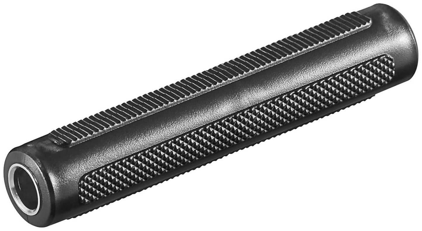 Dobbelt hunstik til 6,3 mm mono, sort cylinderformet metaladapter med rillet greb og glat åbning i den ene ende.