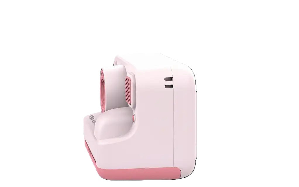 DENVER børnekamera med print, hvid og pink, kompakt instant print kamera med cirkulær åbning, knapper og ventilationshuller.