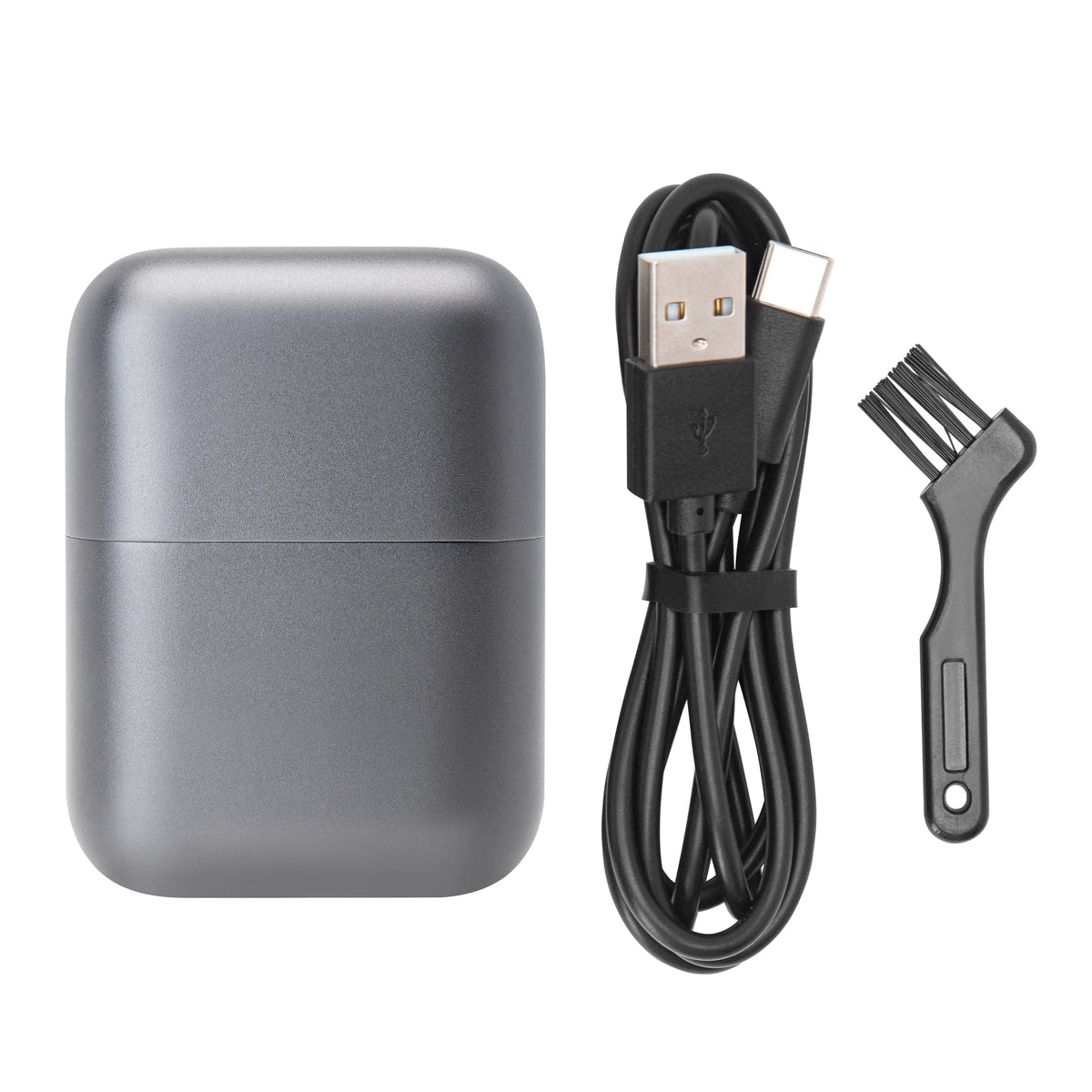 Grå mini-hårklipper med 3 skær, IPX7, USB-C, inklusive USB-C-kabel og rensebørste.