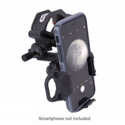 Celestron NexYZ 3 Digiscopingadapter sort med mobilholdere, telefon viser månebillede, tekst: Smartphone ikke inkluderet.