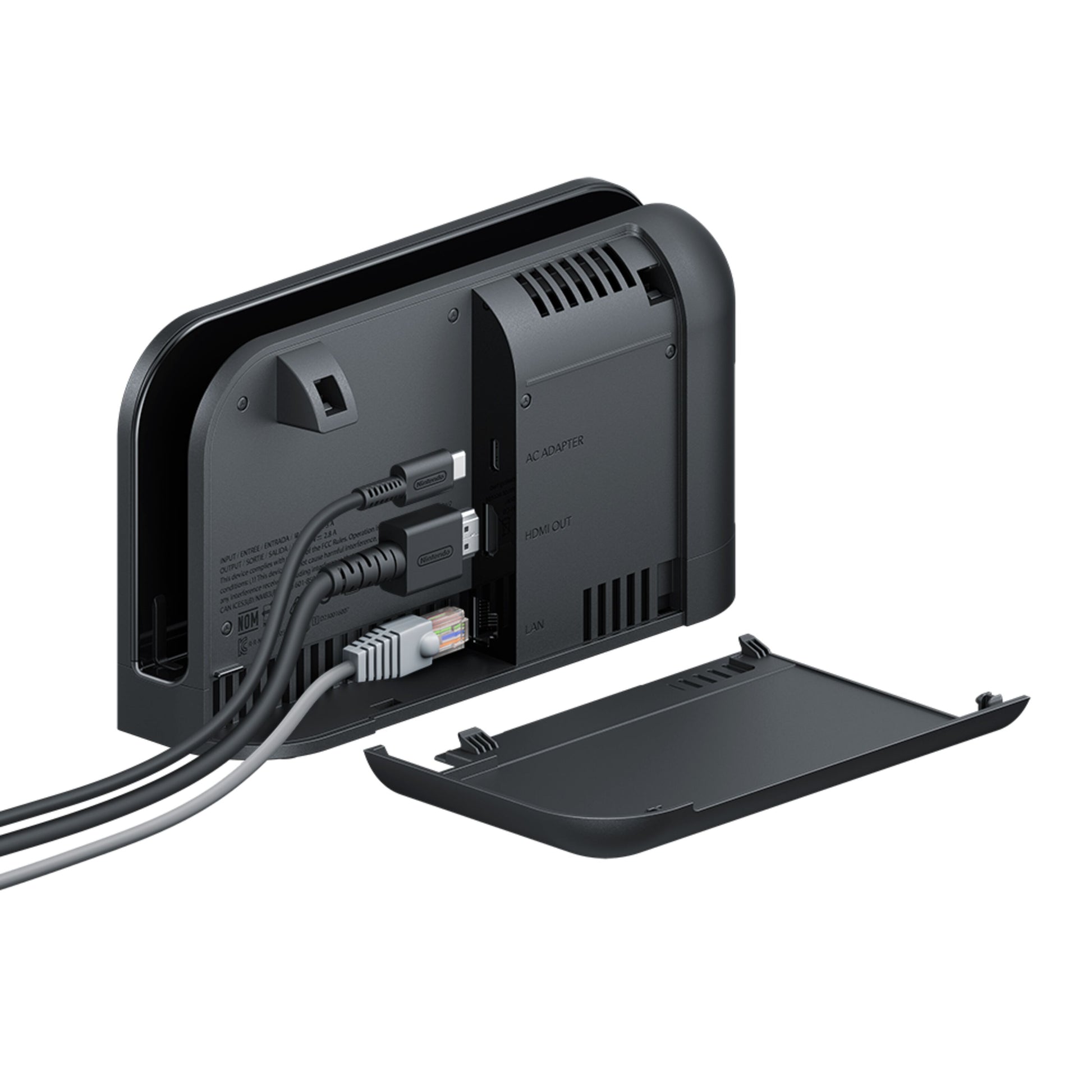 Nintendo Switch 2 Spillekonsol 7,9" sort med bagcover fjernet, synlige porte til AC adapter, HDMI out og LAN, tilsluttede kabler.