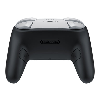 Nintendo Switch 2 Pro Controller bagfra i sort og hvid med skulderknapper, greb, håndtag og Nintendo-logo.