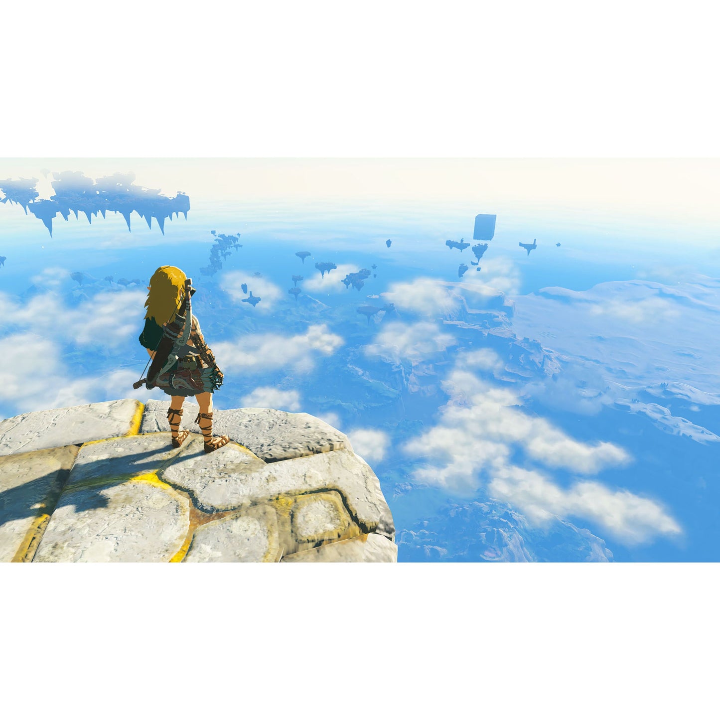 Legenden om Zelda: Rigerens tårer Switch 2, karakter med sværd på klippe, ser ud over flyvende øer.