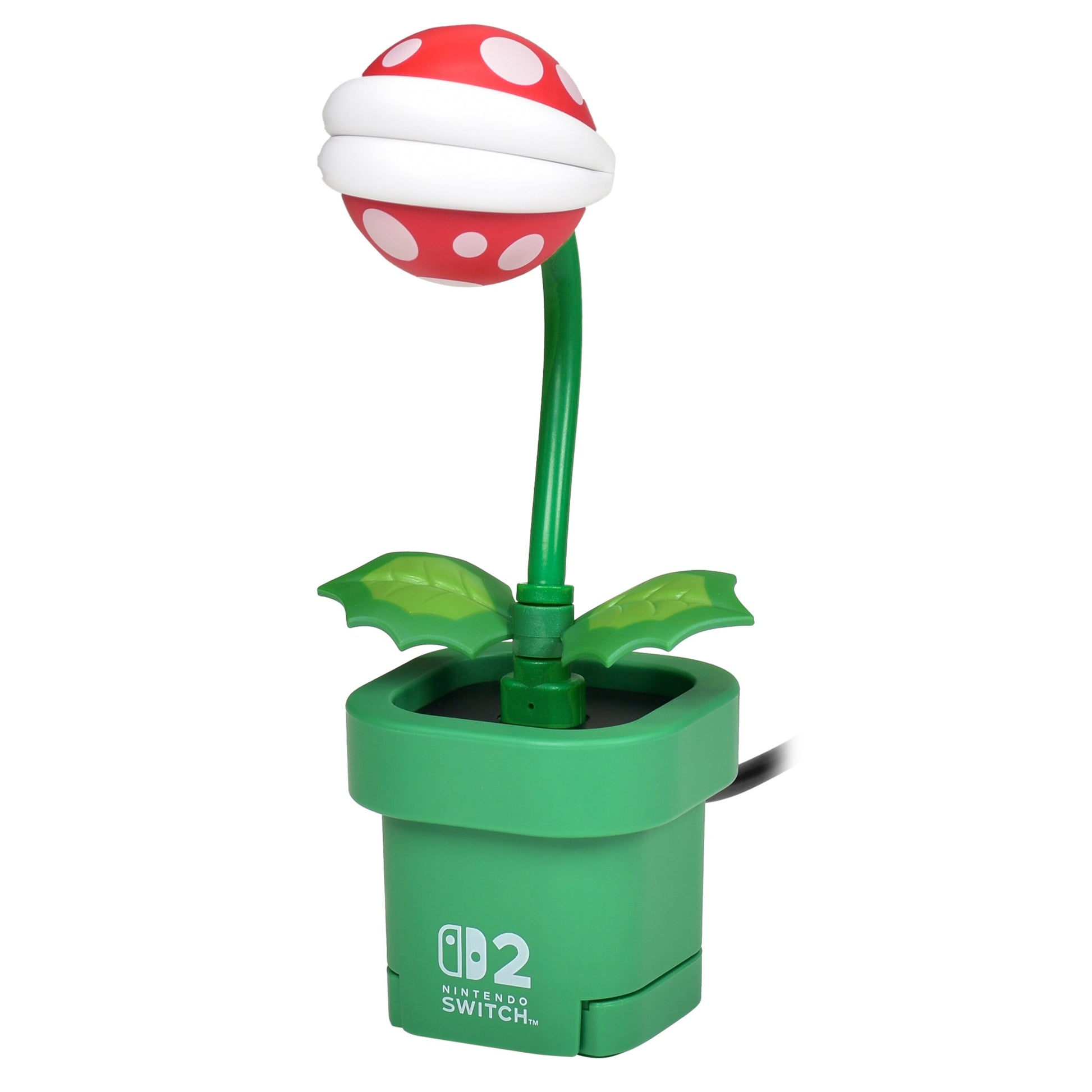 Nintendo Piranha Plant skrivebordslampe med rød-hvide prikker, grøn stilk og blad i grøn potte med "Nintendo Switch kamera.