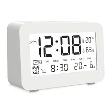 Luxorparts vækkeur med stort display, viser 12:08 PM, 20 °C, 63  luftfugtighed, mandag, alarm og kalender.