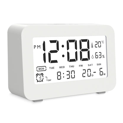 Luxorparts vækkeur med stort display, viser 12:08 PM, 20 °C, 63  luftfugtighed, mandag, alarm og kalender.