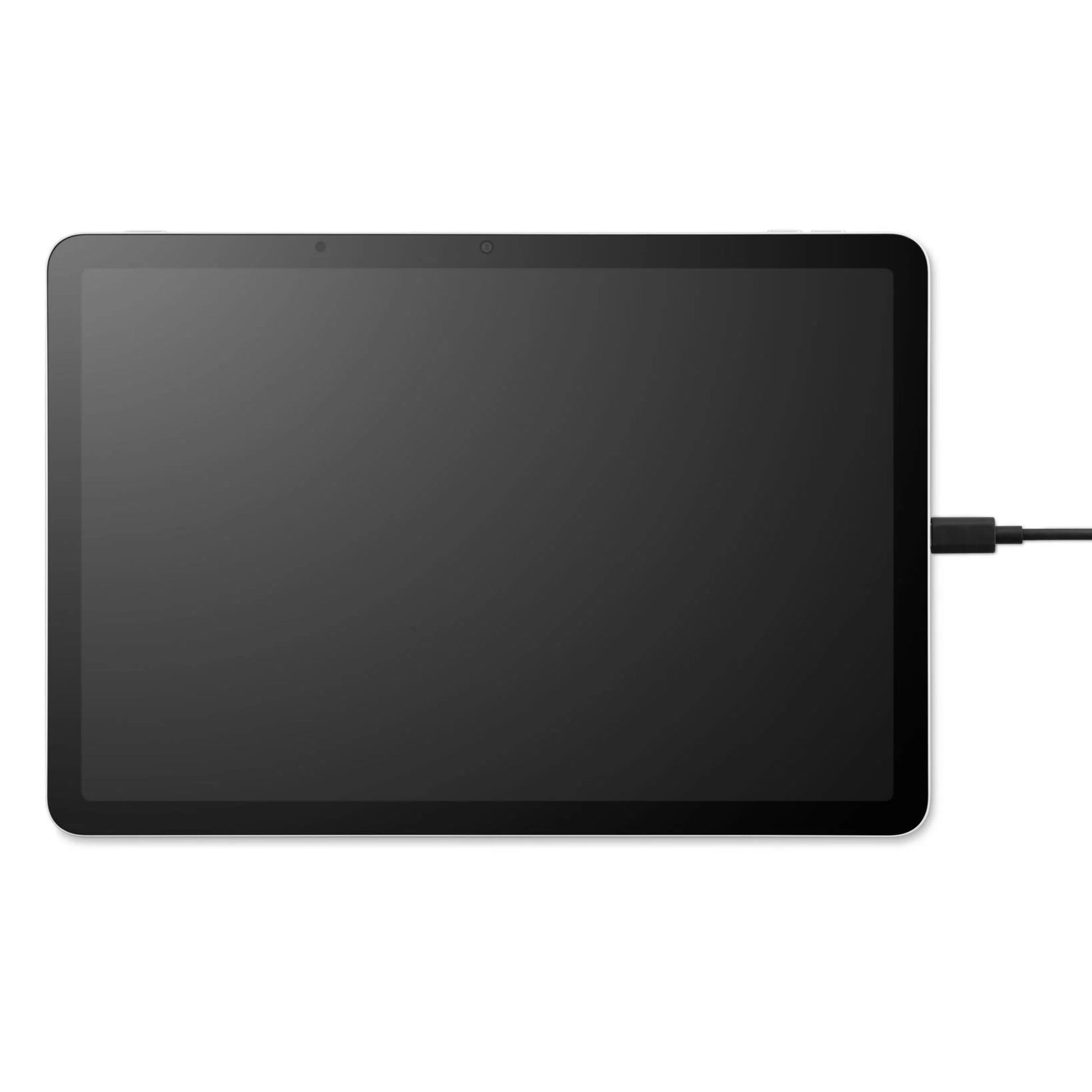 Wacom MovinkPad 11 sort tegneplade med skærm, vises vandret med opladerkabel tilsluttet højre side.