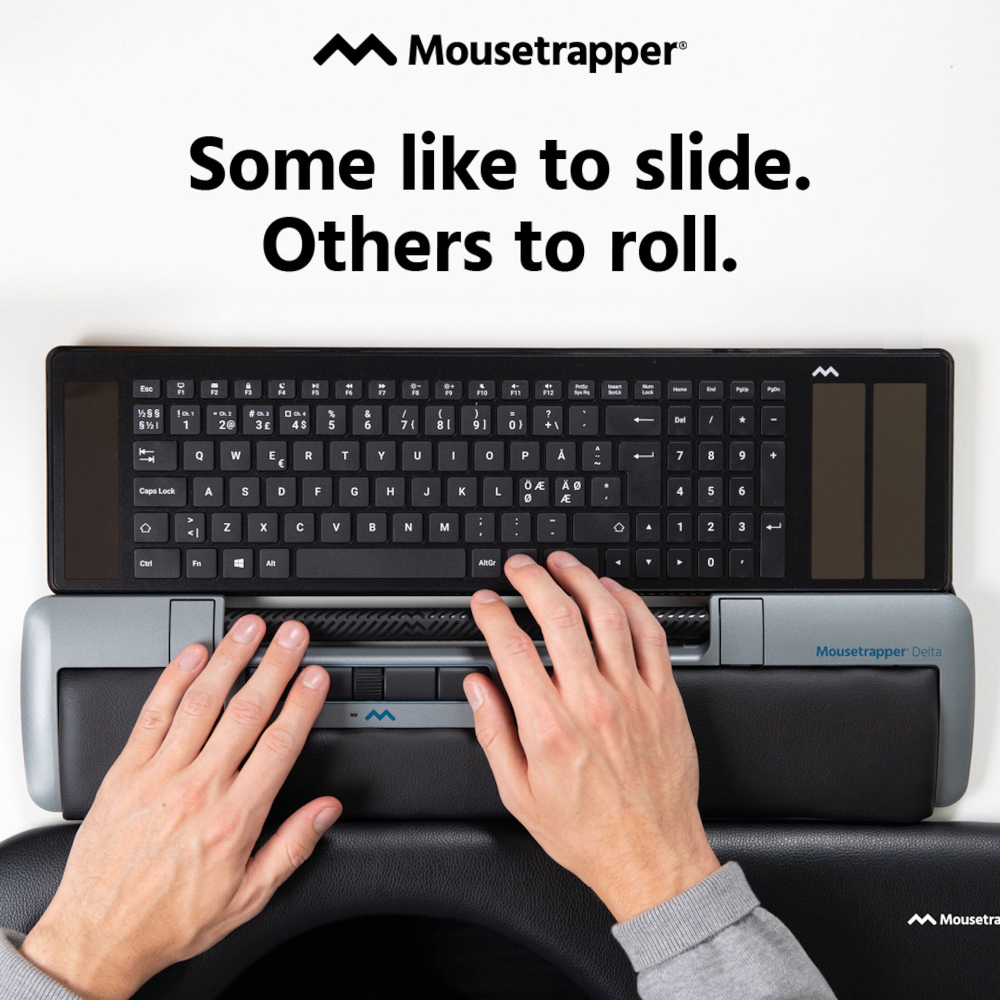Mousetrapper Delta Extended ergonomisk mus med programmerbare knapper foran tastaturet.