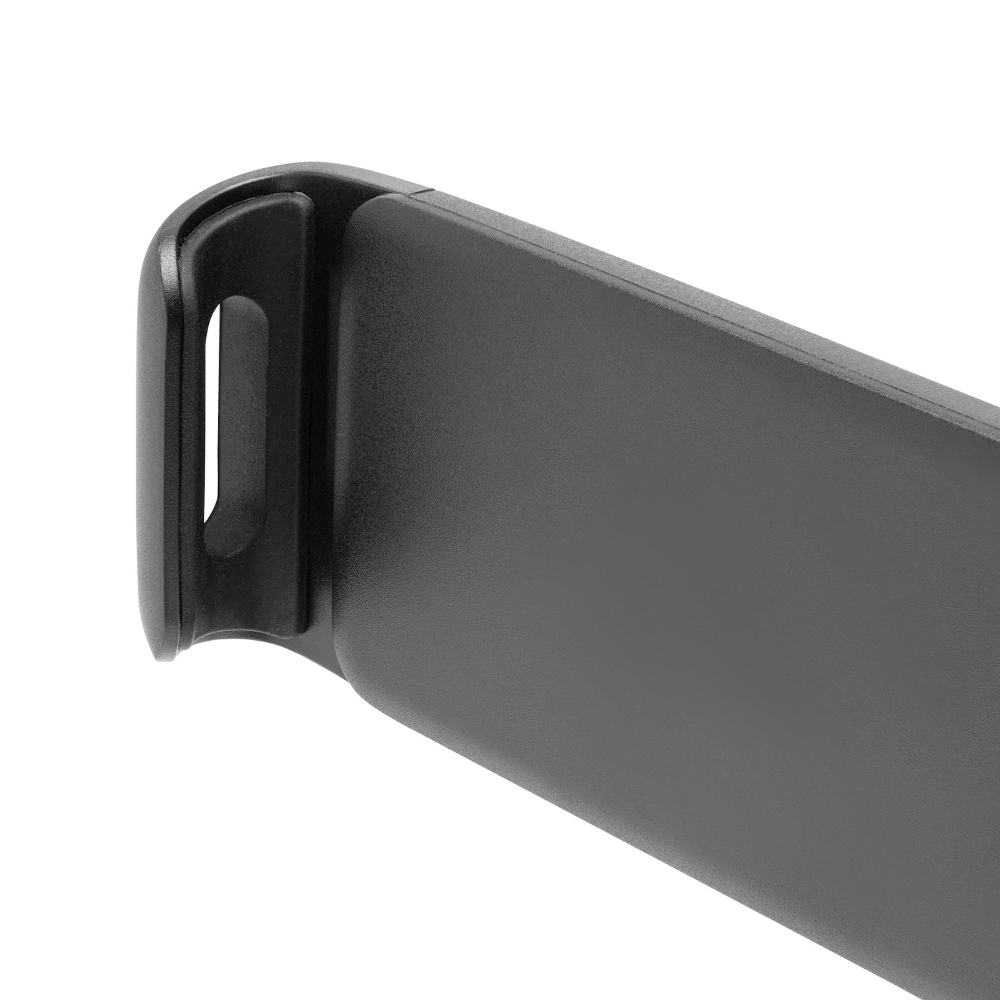 Detalje af sort plastikdel med buet kant og rektangulær udskæring, del af Linocell Bilholder med sugekop til tablet.