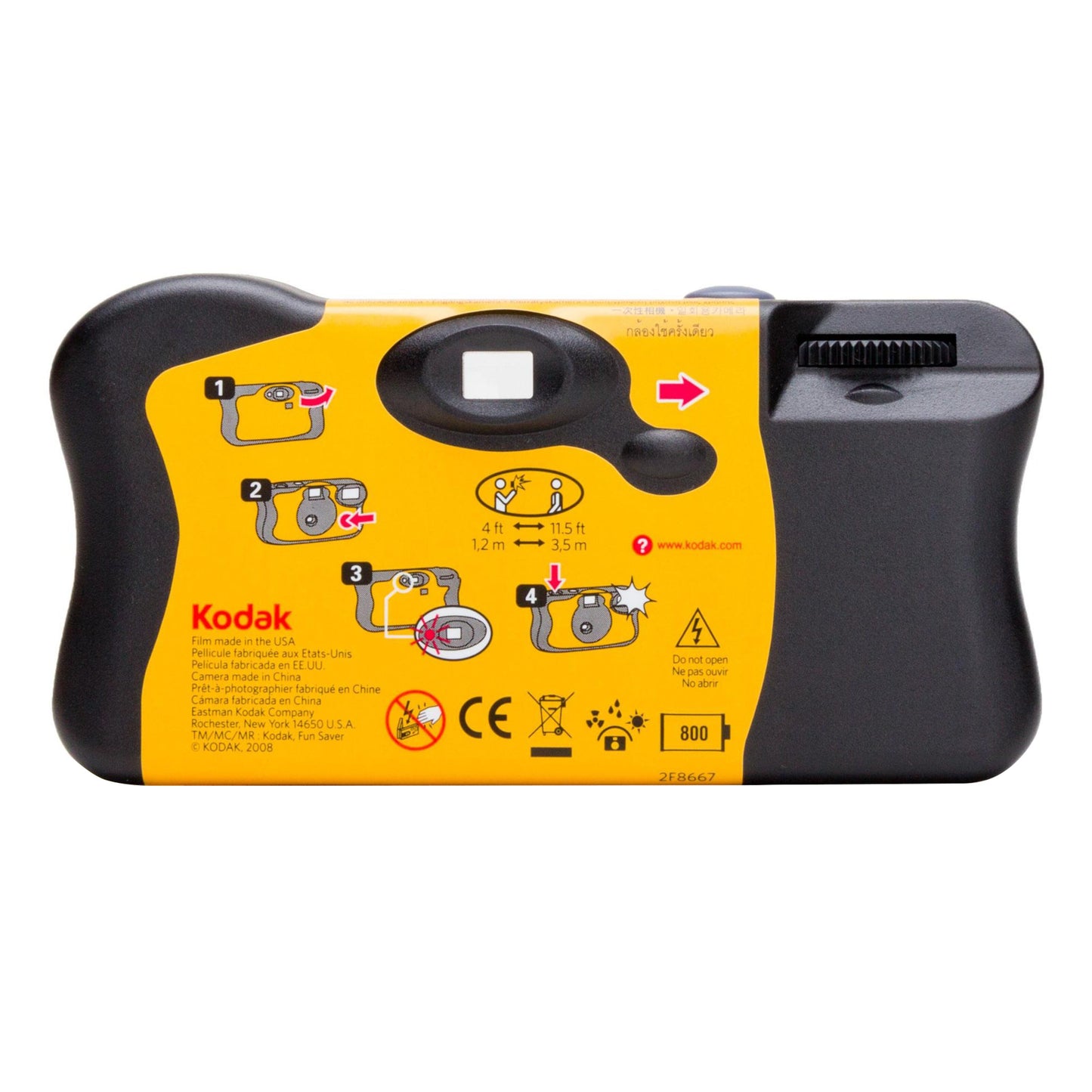 Kodak engangskamera med blitz, 27 billeder, bagside med gule instruktioner og sikkerhedsikoner.