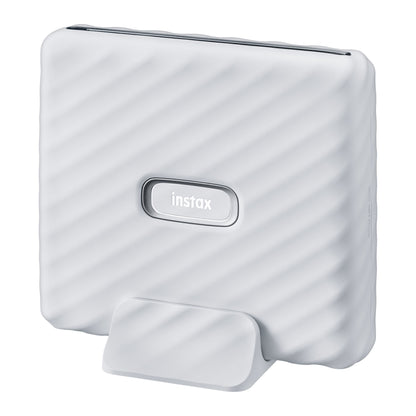 Fujifilm Instax Link Wide smartphone printer, hvid, rektangulær med afrundede kanter, bølget overflade, instax-logo foran.