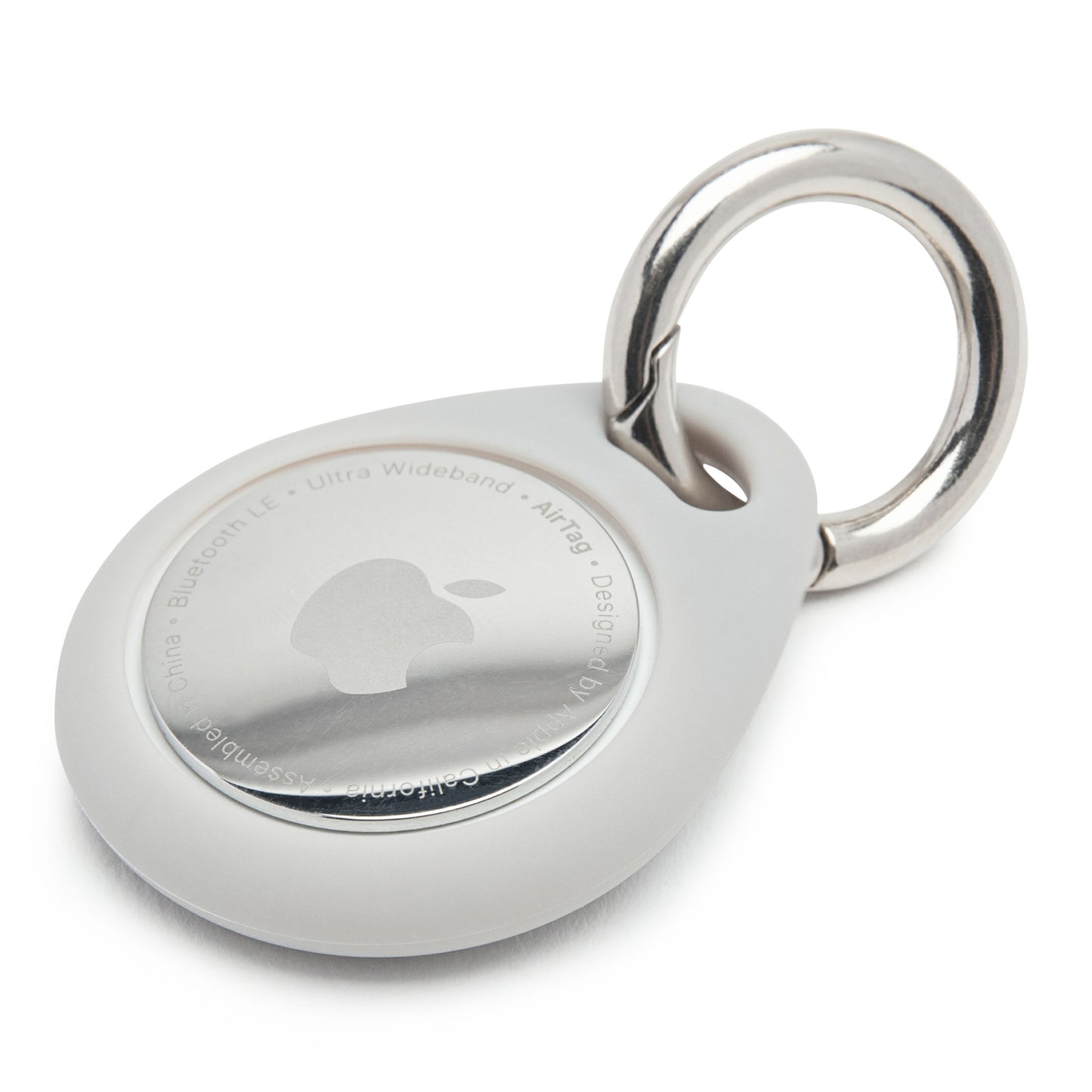 Linocell AirTag nøglering grå i lysegrå silikone med metalring, tæt detalje af design og materialer.