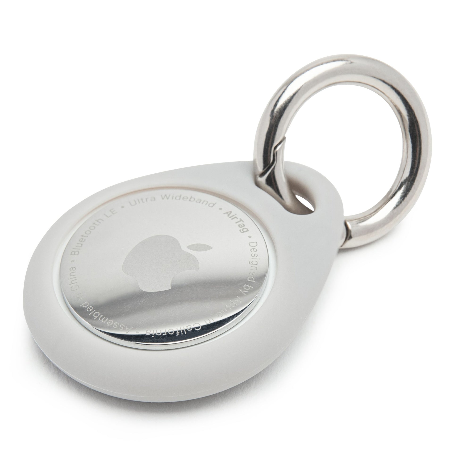 Linocell AirTag nøglering grå i lysegrå silikone med metalring, tæt detalje af design og materialer.