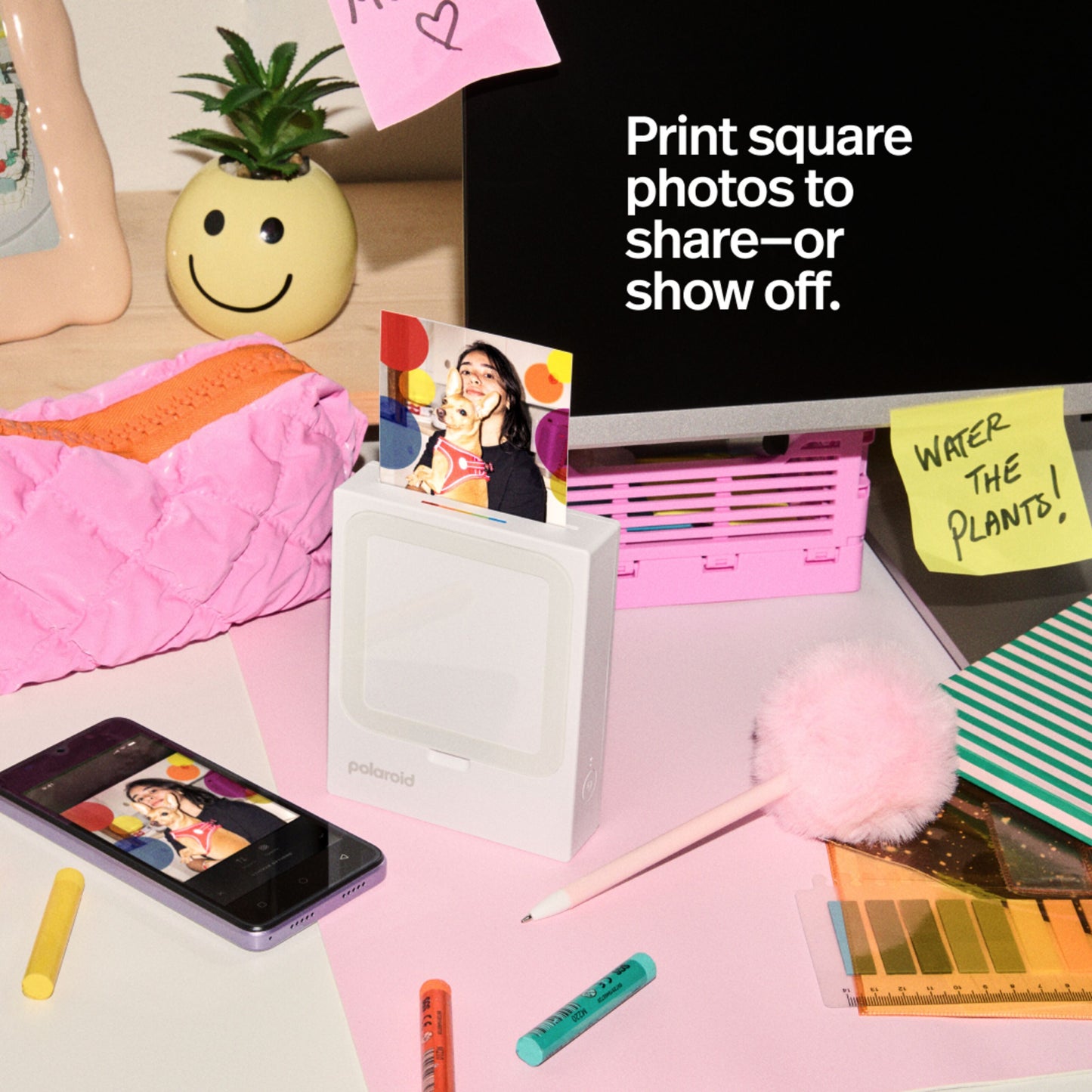 Polaroid Hi-Print 3-3 Foto Printer printer kvadratiske fotos, telefon viser billede, note: "WATER THE PLANTS.