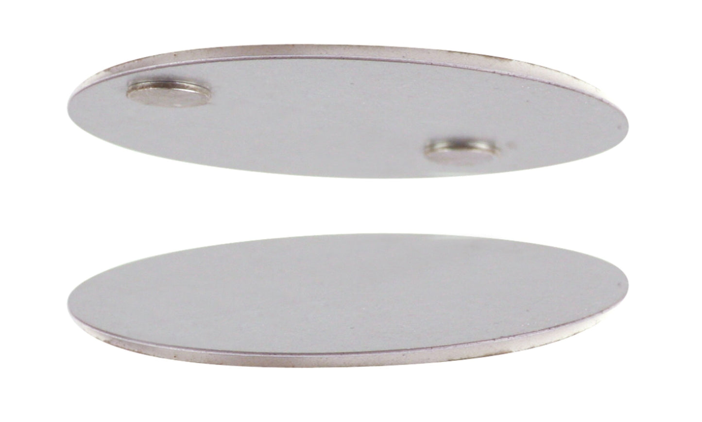 Luxorparts magnetisk monteringsskive, rund, sølvfarvet, tynd, lille ophøjet kant nær yderkant.