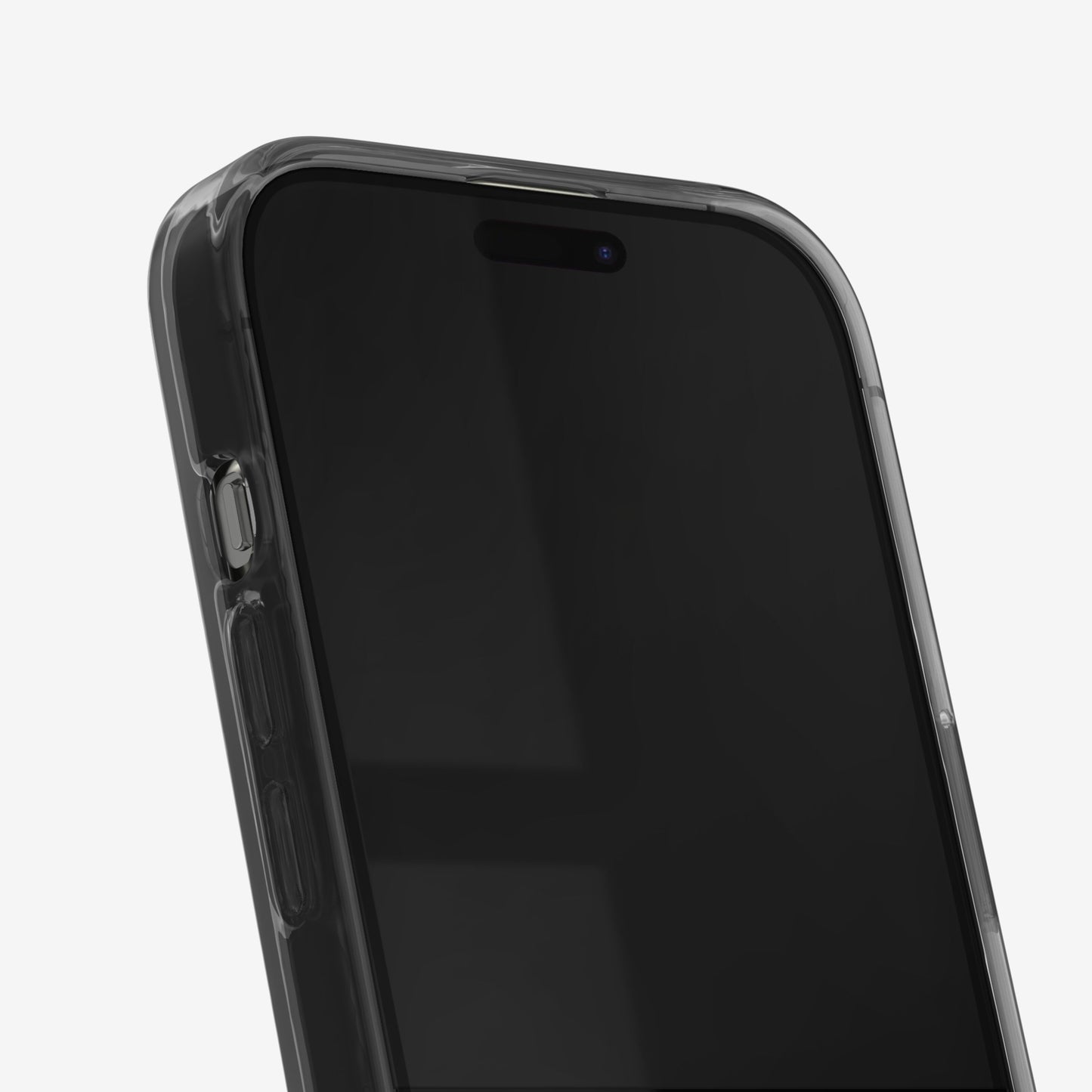 IDEAL OF SWEDEN Clear MagSafe Case til iPhone 13-16e Tinted Black med genanvendt plast, synlige sideknapper og frontkamera.