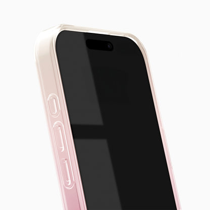 IDEAL OF SWEDEN Clear MagSafe Case til iPhone 16 Rose Blush med sideknapper, sort skærm og vinduesrefleksion.