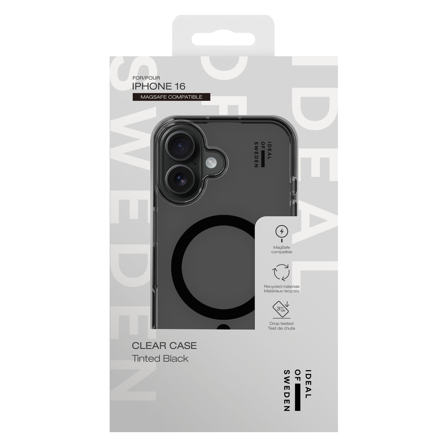 IDEAL OF SWEDEN Clear MagSafe Case Tinted Black til iPhone 16 i emballage med dropbeskyttelse og logo nederst til højre.