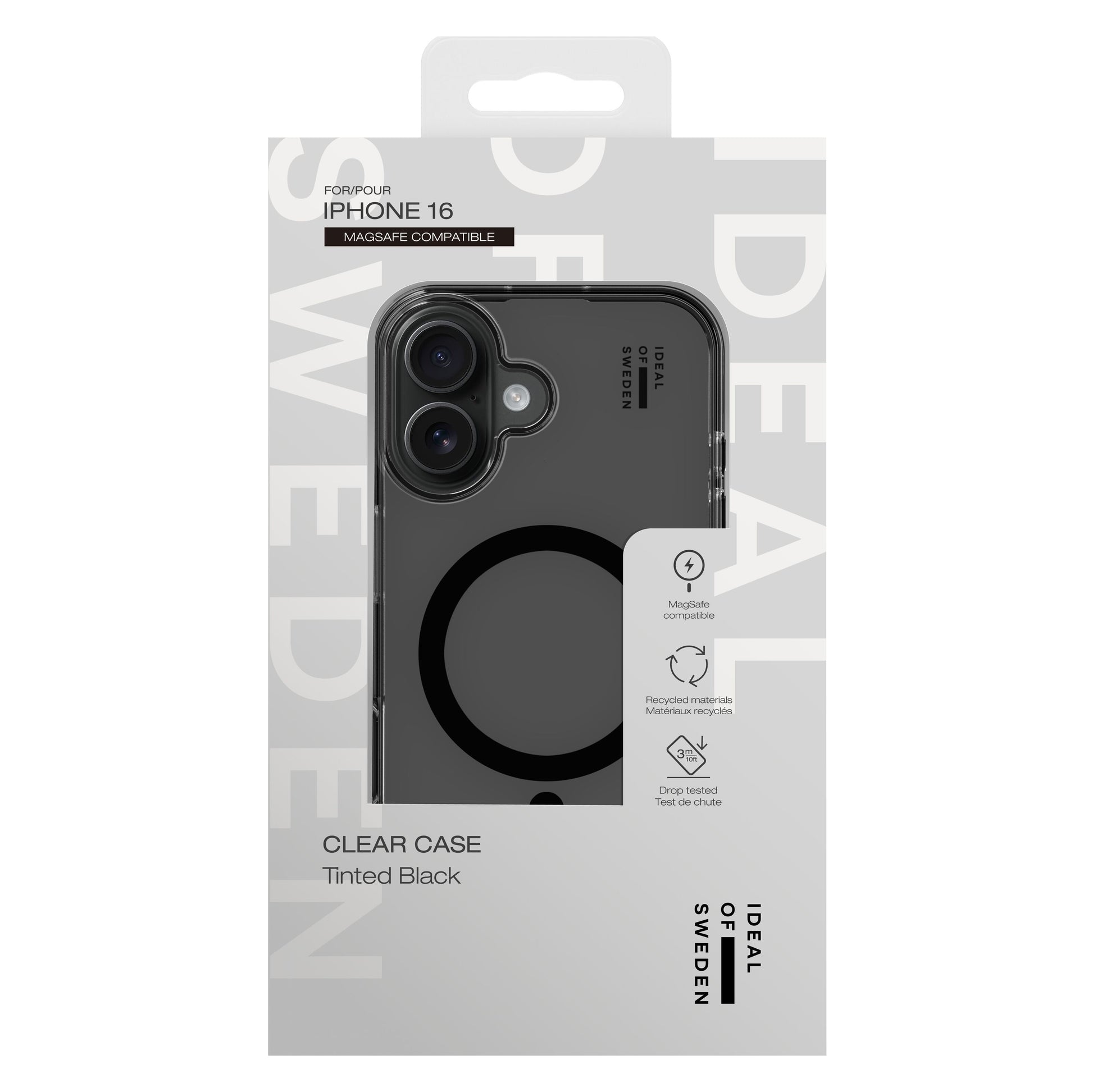 IDEAL OF SWEDEN Clear MagSafe Case Tinted Black til iPhone 16 i emballage med dropbeskyttelse og logo nederst til højre.
