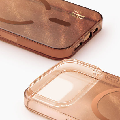 IDEAL OF SWEDEN Clear MagSafe cover til iPhone 17 Pro, transparent brun med guldprikker, cirkulær MagSafe, guldlogo.