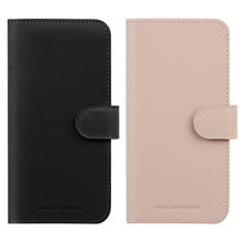 IDEAL OF SWEDEN Magnet Wallet+ til Galaxy S25 i sort og pink med knaplukning, dyrefri materialer, logo nederst.