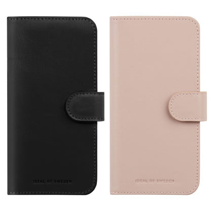 IDEAL OF SWEDEN Magnet Wallet+ pungcover til iPhone 16 sort og pink med rem-lås og præget logo nederst.