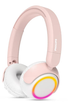 Philips TAK4206 trådløse børnehovedtelefoner i rosa med hvide ørepuder, LED-lys i gul/orange/pink, volumen 85 dB.