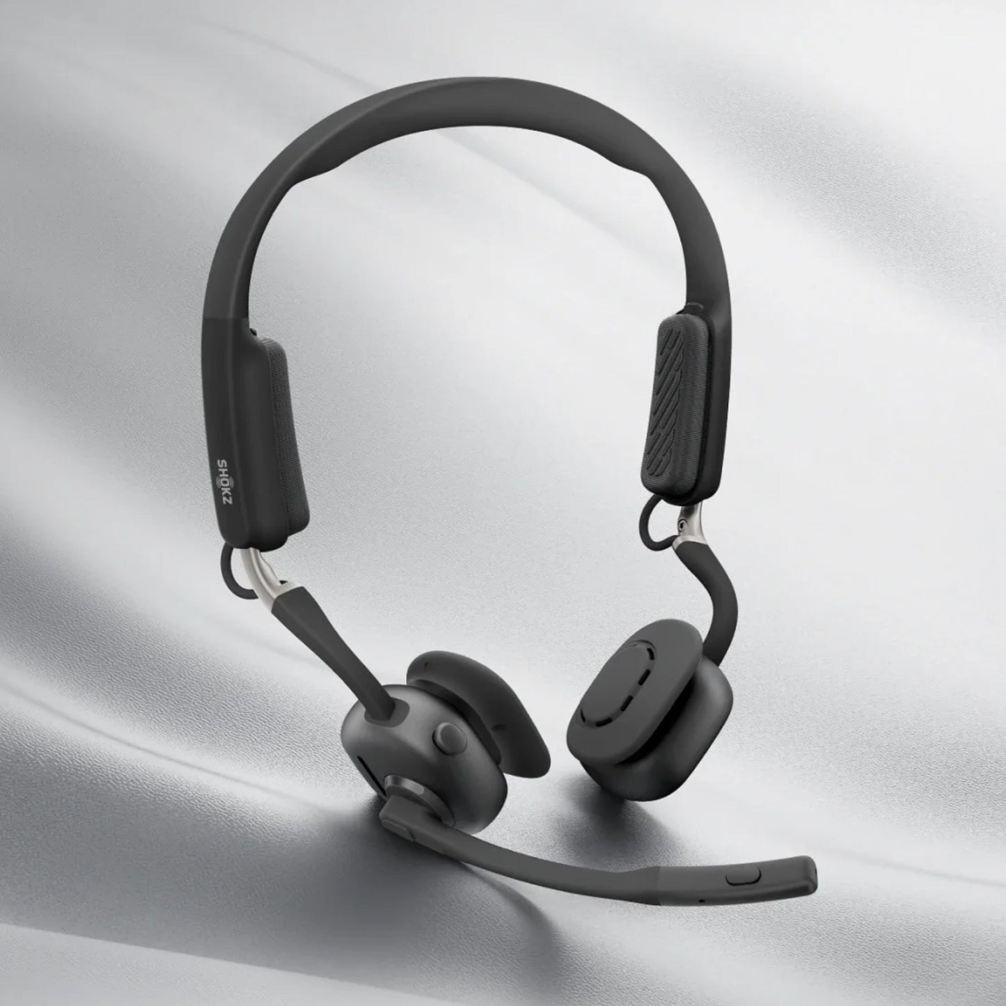 Shokz OpenMeet Kontorhovedtelefoner trådløst headset i sort med justerbar hovedbøjle og fast mikrofon.