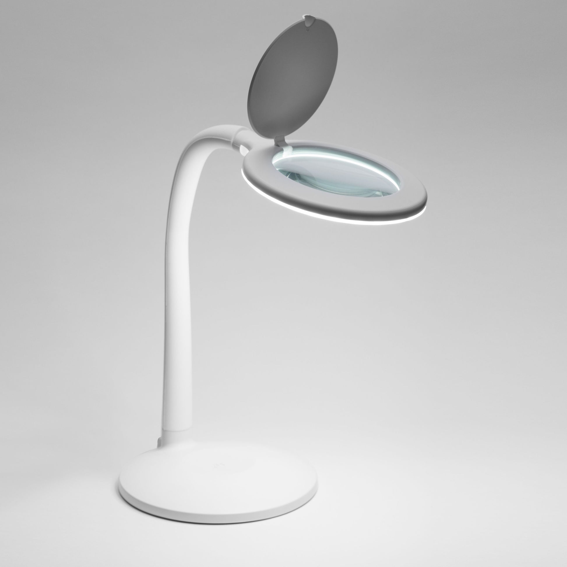 Arbejdsbelysning med forstørrelse LED 410 lm, hvid lampe med LED-lys og flip-up låg på rund fod.