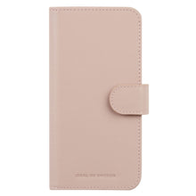 IDEAL OF SWEDEN Magnet Pung+ til iPhone 15 Pro lyserød imiteret læder, syede kanter, magnetluk, præget logo nederst.