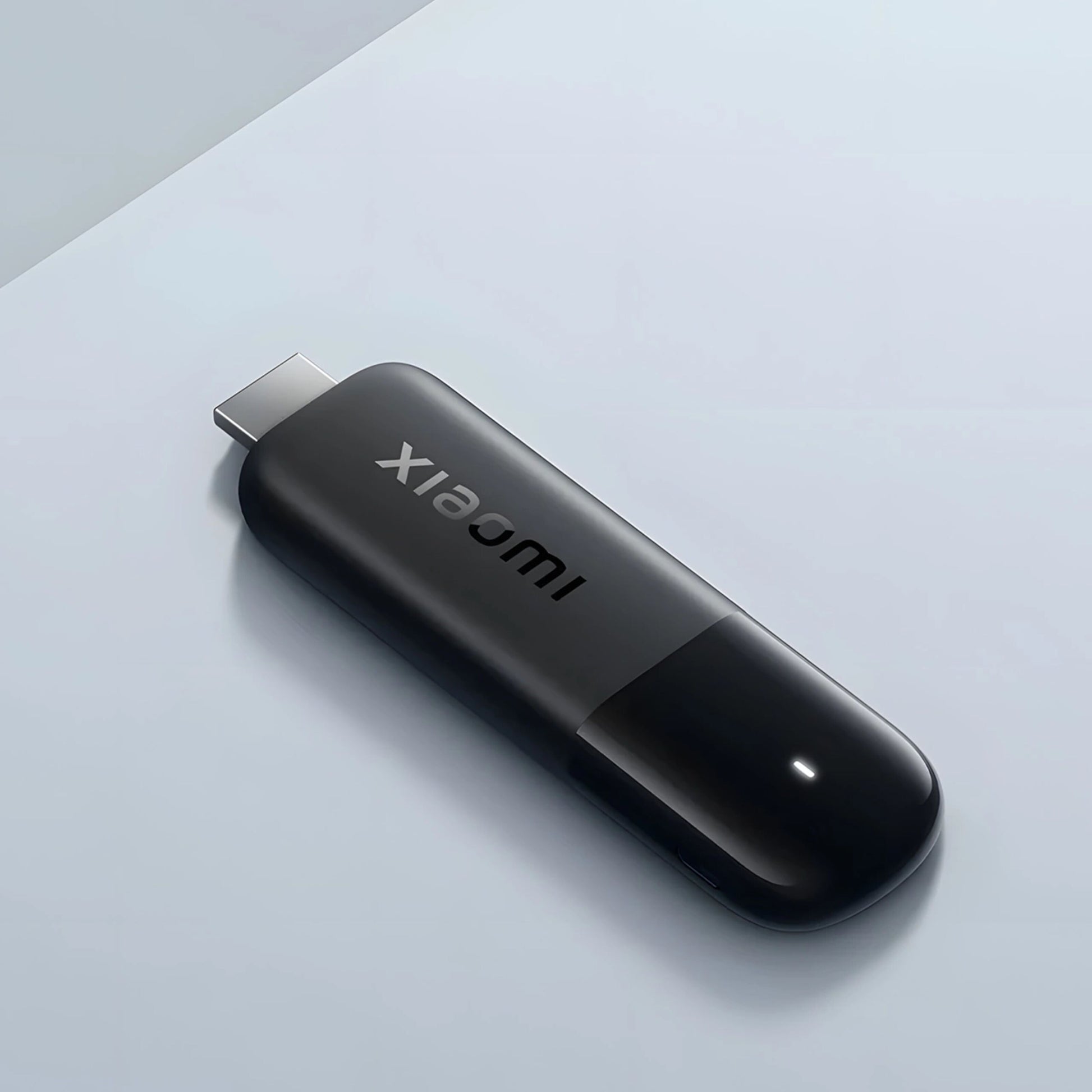 Xiaomi TV Stick 4K 2. gen sort, HDMI-stik synligt, rektangulær med afrundede kanter, Google TV-logo.
