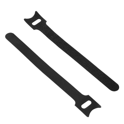 Linocell kabelsamler 2-pak sort, hook-and-loop design, én holder fladt synlig og én vinklet.