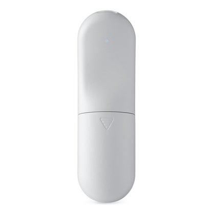 Kobo Trådløs sideomskifter, hvid cylinder med afrundet top, lille LED-indikator og diskret pilesymbol på nedre halvdel.