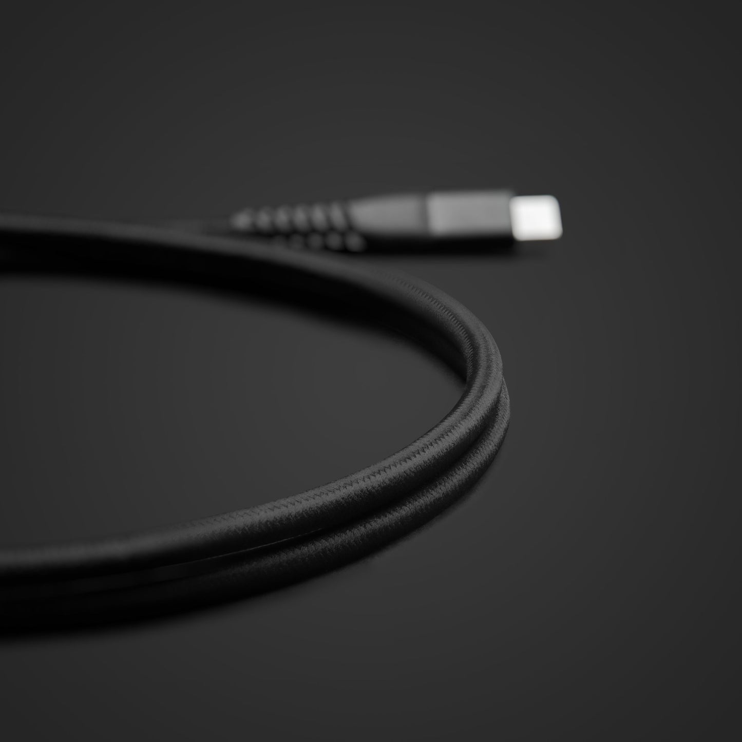 Linocell Premium Kevlar USB-C 3.2 kabel sort 1m, rullet sammen, synlig USB-C stik med Power Delivery 100W.