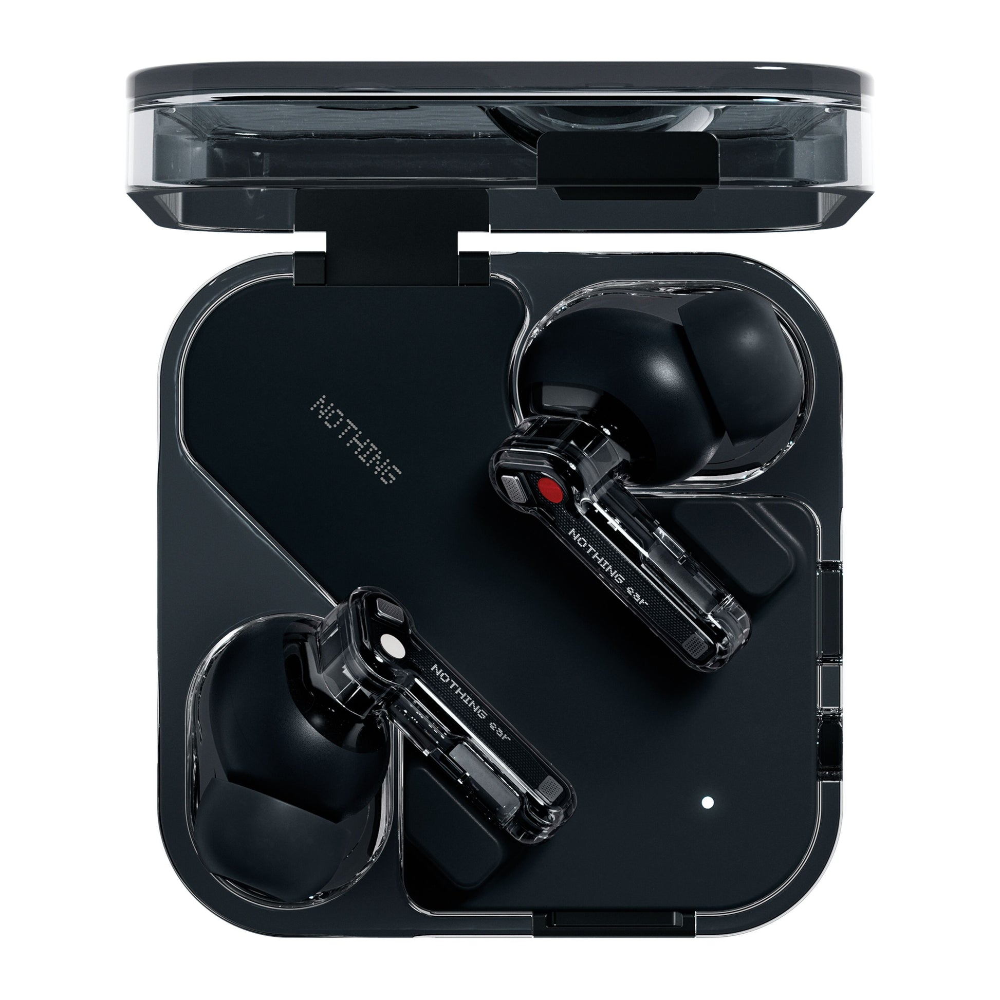 Nothing Ear trådløse høretelefoner sorteret med transparent stilk i åben gennemsigtig opladningsetui med NOTHING-logo.