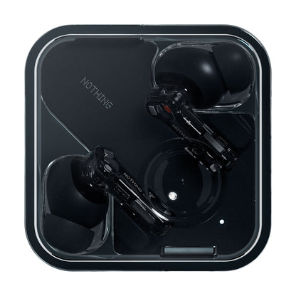 Nothing Ear Sort trådløse høretelefoner med transparente stænger i firkantet gennemsigtig etui med NOTHING-logo og aktiv støjreduktion.
