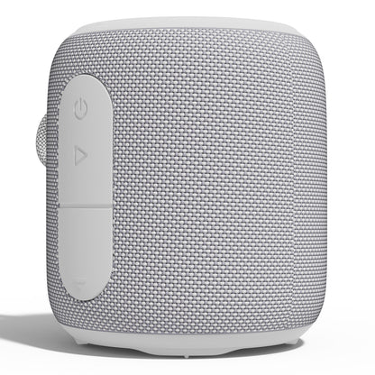 Nomadelic Loud 705 vandtæt Bluetooth-højttaler grå med vævet tekstur og prægede strøm- og lydstyrkeknapper.
