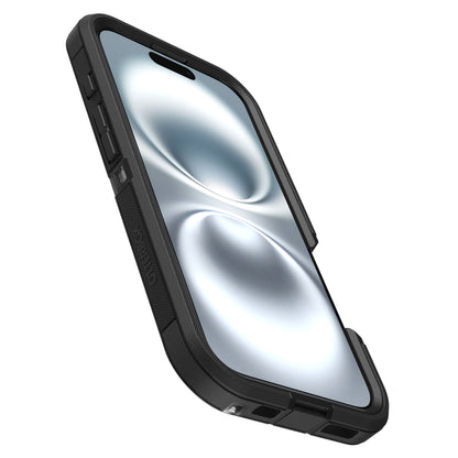 Otterbox Defender XT Dark Side cover til iPhone 16, vises i vinkel, med grå-hvide cirkler på skærm og MagSafe-kompatibilitet.