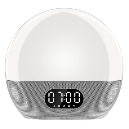 WiiM vækkeur med wake-up light, lysende kuppel, digitalt display 07:00, højtalergrill og ikoner til alarm, søvn og Wi-Fi.