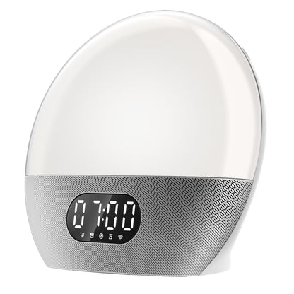 WiiM Vækkeur wake-up light med lysende kuppel, digitalt display kl. 7:00, små ikoner, højttalergrill nederst.