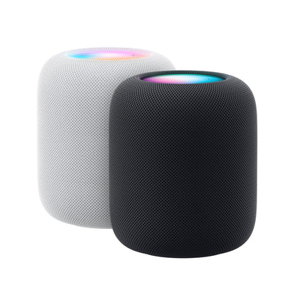 Apple HomePod Midnat smart højttalere i hvid og sort med mesh-yder, flerfarvet toplampe, rumlig lyd og stemmestyring.