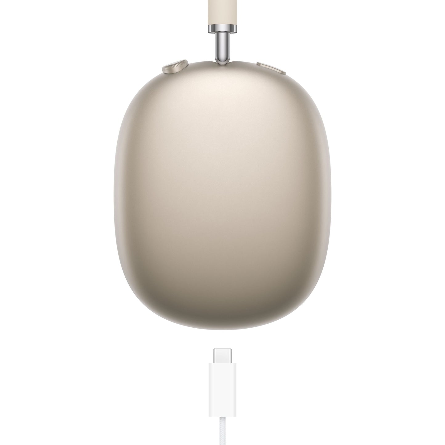 Apple AirPods Max Stjernelys over-ear hovedtelefoner close-up af ørekop med opladningskabel tilsluttet nederst.
