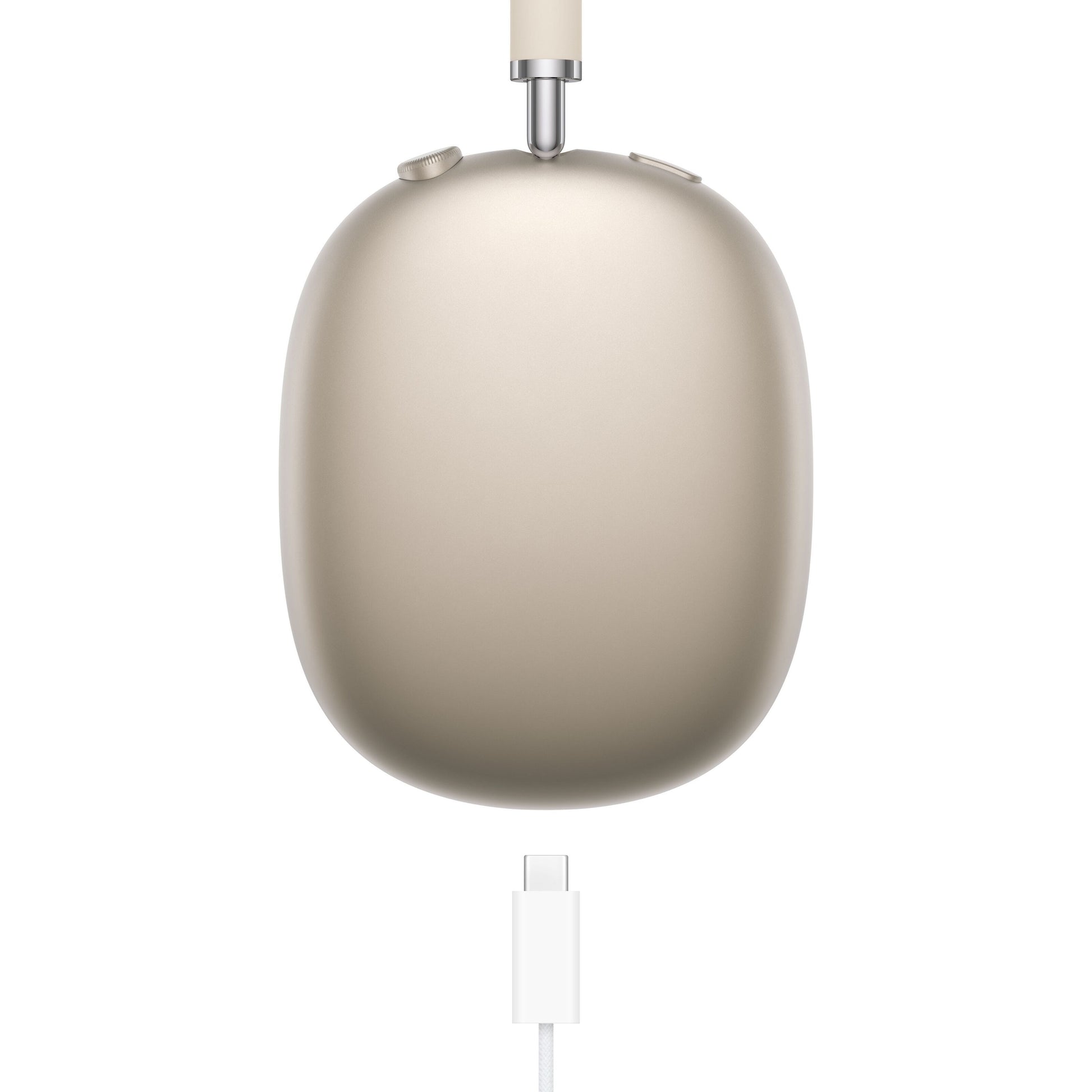 Apple AirPods Max Stjernelys over-ear hovedtelefoner close-up af ørekop med opladningskabel tilsluttet nederst.