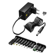 Justerbar strømadapter 3-12V DC 3,6W med EU-stik, spiralkabel, 7 DC-stik og 4 USB-stik i rækker.