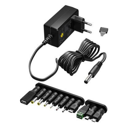 Justerbar strømadapter 3-12V DC 3,6W med EU-stik, spiralkabel, 7 DC-stik og 4 USB-stik i rækker.