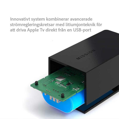 Apple TV Strømadapter USB tæt på, viser printplade og blå lithiumbatteri, svensk tekst om avanceret strømkontrol ovenfor.