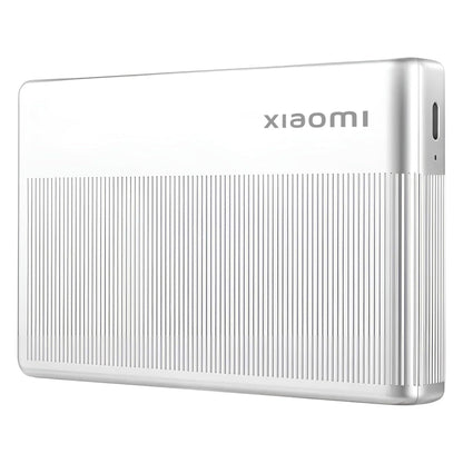 Xiaomi ekstern harddisk sølv, ribbet bund, Xiaomi logo på toppen.