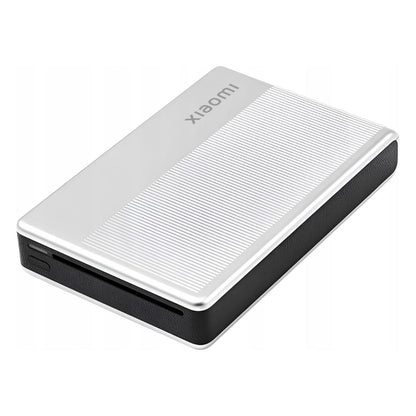 Xiaomi ekstern harddisk sølv/sort med logo ved siden af Xiaomi Bærbar fotoprinter 1S ZINK Zero Ink.