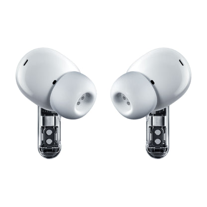 Nothing Ear (3) hvide in-ear høretelefoner med silikonepropper, gennemsigtige stænger og synlige indvendige komponenter.